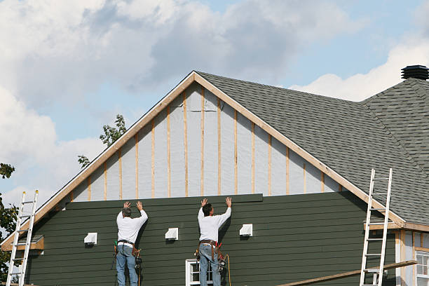 Professional Siding Contractor technician working in Forest City, NC